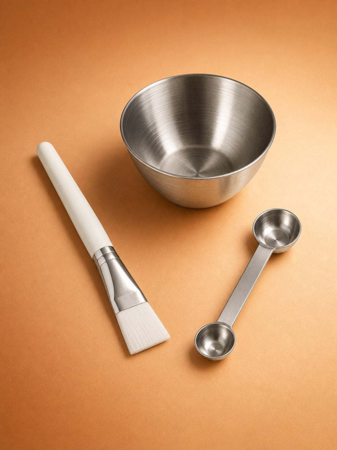 Mixing bowl, brush and measuring spoon